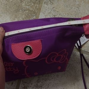 Hello kitty make up bag or collection bag 9"X 5.5"X 5.5" Good size bag.